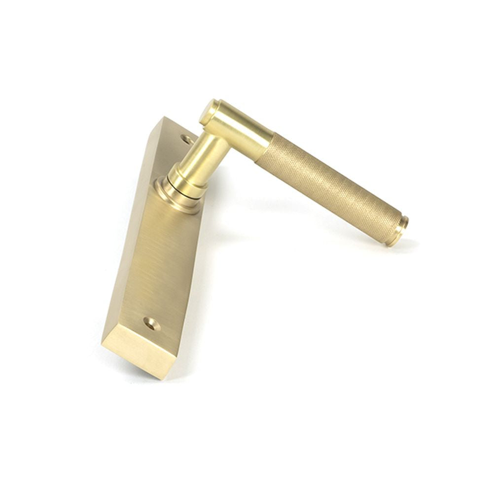 High quality images of the From The Anvil - Satin Brass Brompton Slimline Lever Espag. Latch Set | Sku. Anvil-52419 | available to order from Trade Door Handles, quick delivery at discounted prices.