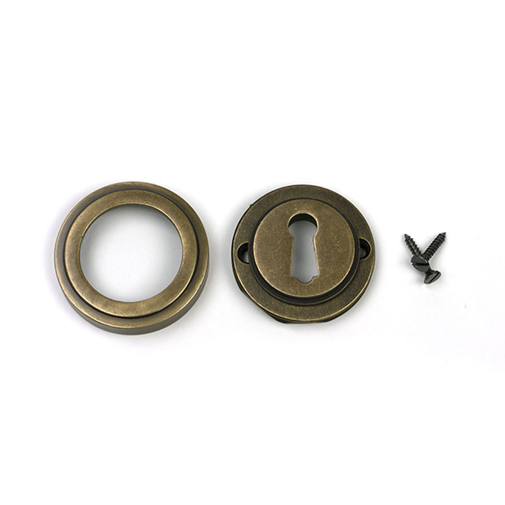 High quality images of the From The Anvil - Burnished Brass Round Escutcheon (Art Deco) | Sku. Anvil-52444 | available to order from Trade Door Handles, quick delivery at discounted prices.