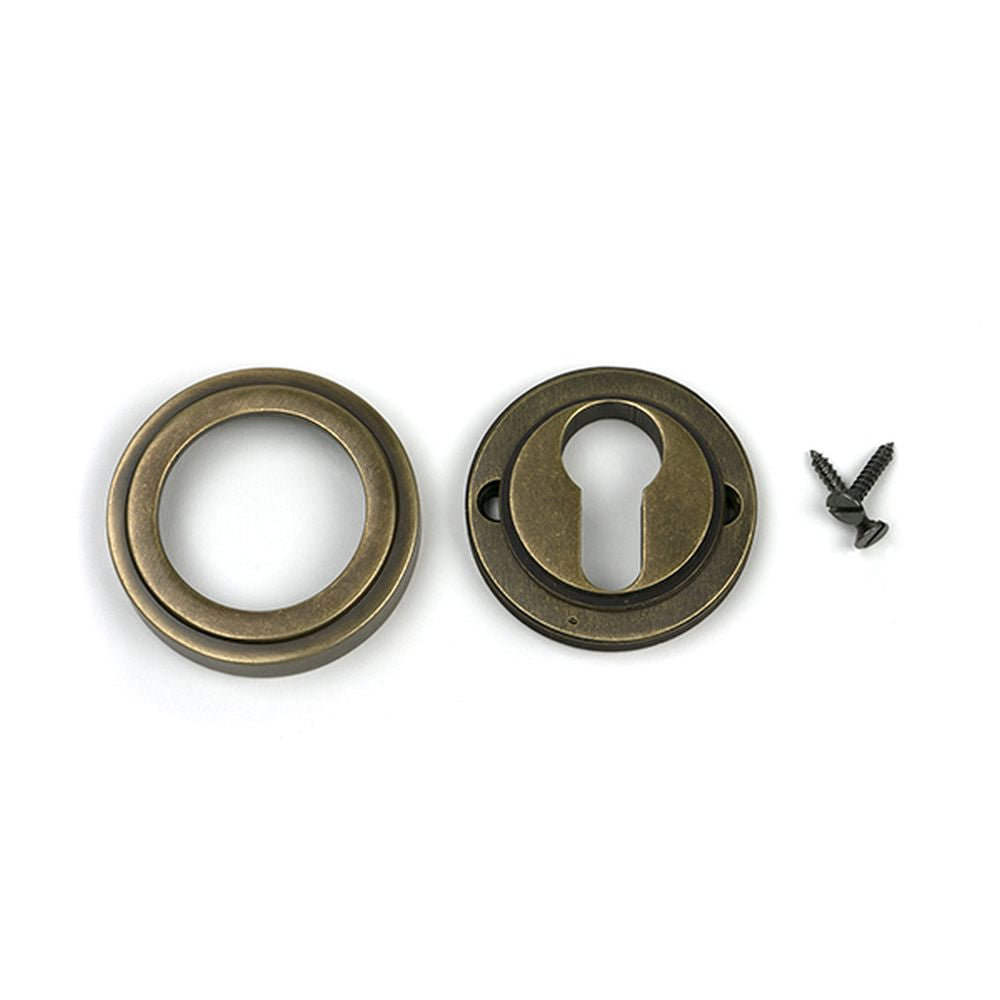 High quality images of the From The Anvil - Burnished Brass Round Euro Escutcheon (Art Deco) | Sku. Anvil-52448 | available to order from Trade Door Handles, quick delivery at discounted prices.
