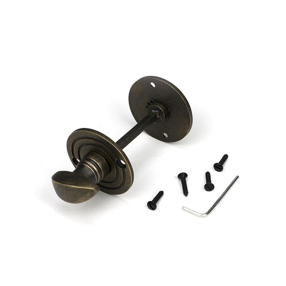 High quality images of the From The Anvil - Burnished Brass Round Bathroom Thumbturn | Sku. Anvil-52462 | available to order from Trade Door Handles, quick delivery at discounted prices.