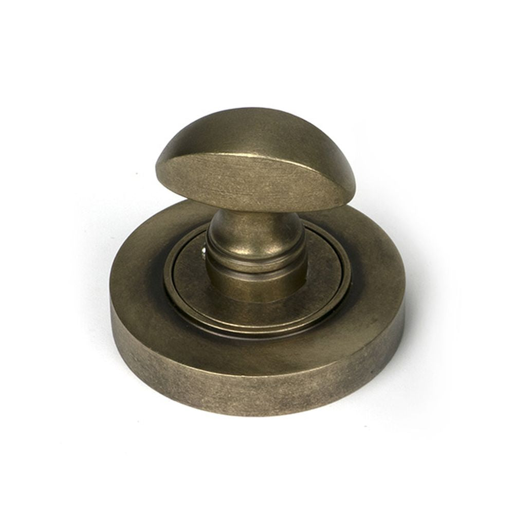 High quality images of the From The Anvil - Burnished Brass Round Thumbturn Set (Plain) | Sku. Anvil-52464 | available to order from Trade Door Handles, quick delivery at discounted prices.