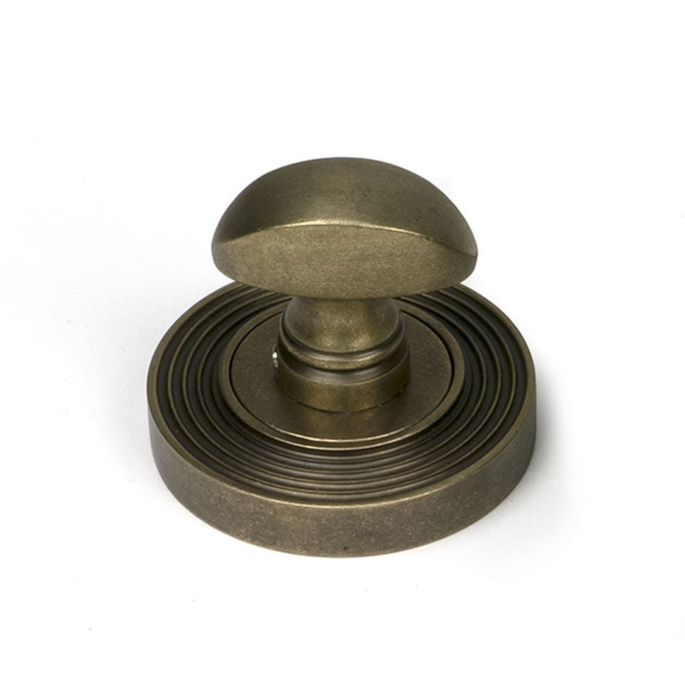High quality images of the From The Anvil - Burnished Brass Round Thumbturn Set (Beehive) | Sku. Anvil-52466 | available to order from Trade Door Handles, quick delivery at discounted prices.
