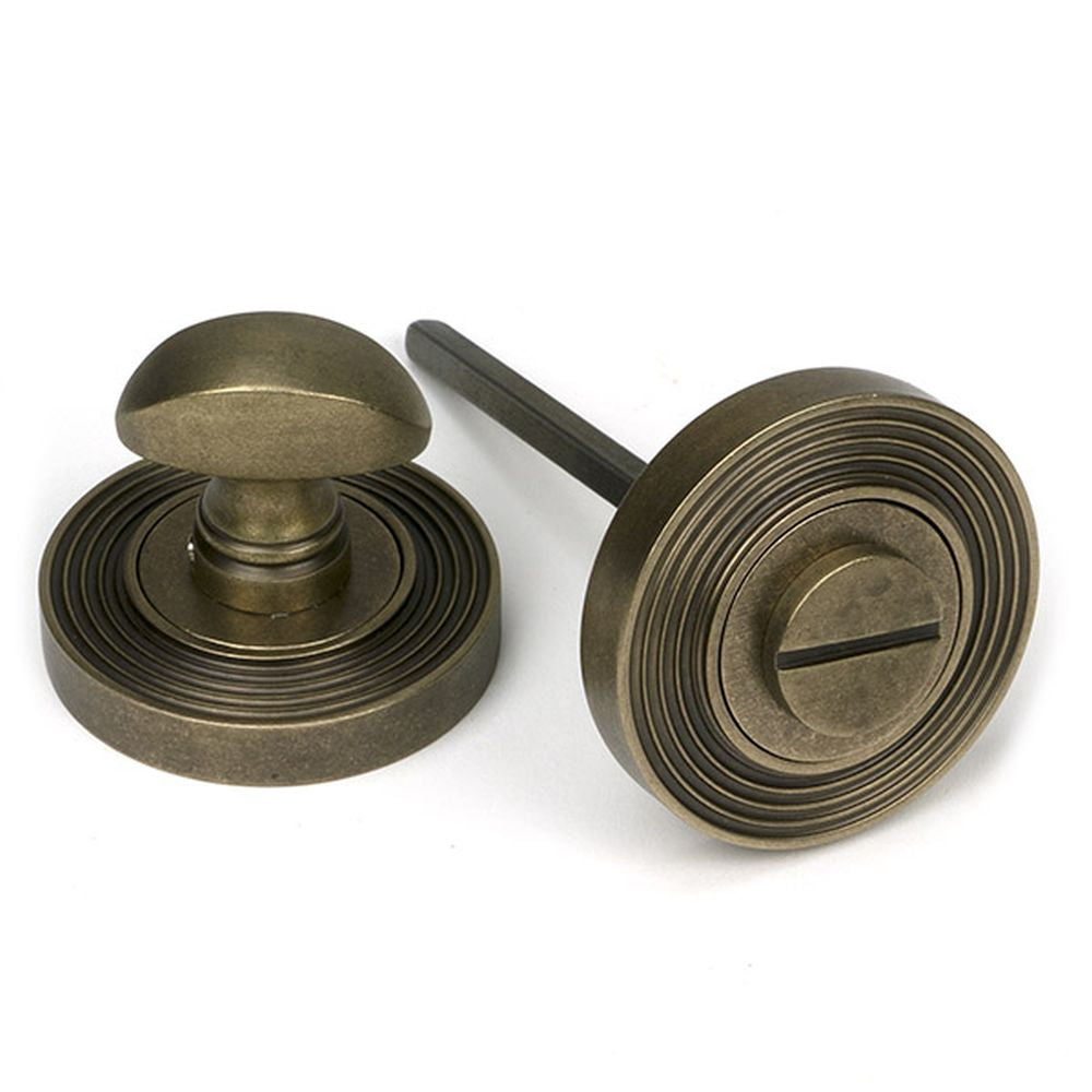 High quality images of the From The Anvil - Burnished Brass Round Thumbturn Set (Beehive) | Sku. Anvil-52466 | available to order from Trade Door Handles, quick delivery at discounted prices.