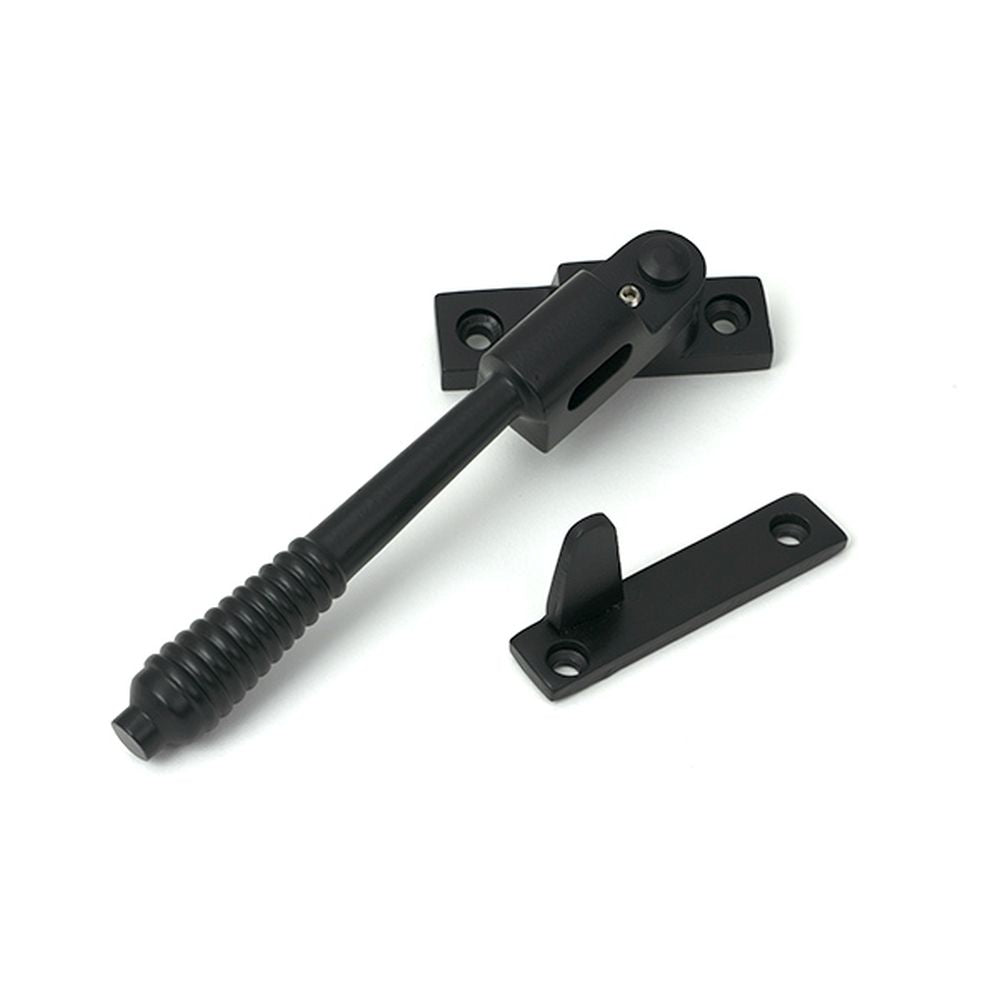 High quality images of the From The Anvil - Matt Black Night-Vent Locking Reeded Fastener | Sku. Anvil-52525 | available to order from Trade Door Handles, quick delivery at discounted prices.