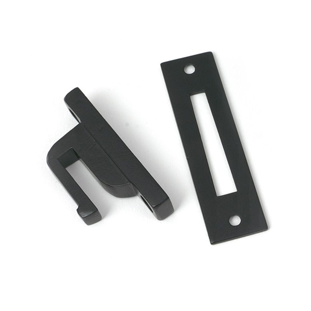 High quality images of the From The Anvil - Matt Black Locking Reeded Fastener | Sku. Anvil-52529 | available to order from Trade Door Handles, quick delivery at discounted prices.
