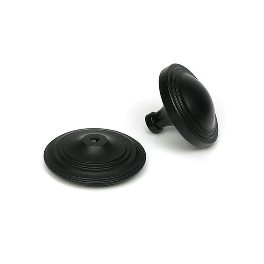 High quality images of the From The Anvil - Matt Black Art Deco Centre Door Knob | Sku. Anvil-52533 | available to order from Trade Door Handles, quick delivery at discounted prices.