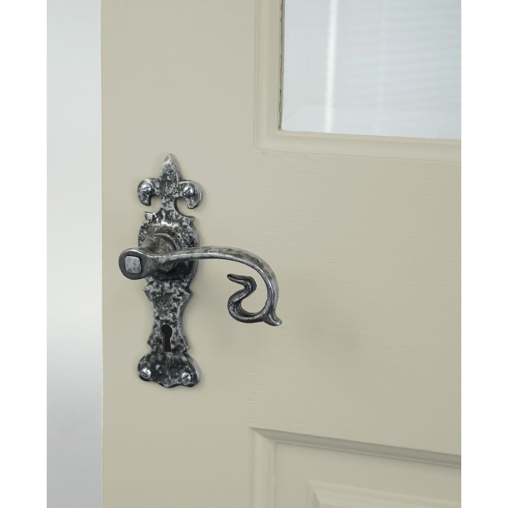 From The Anvil - Natural Textured Curly Lever Lock Set | Sku. 83500 | Trade Door Handles.