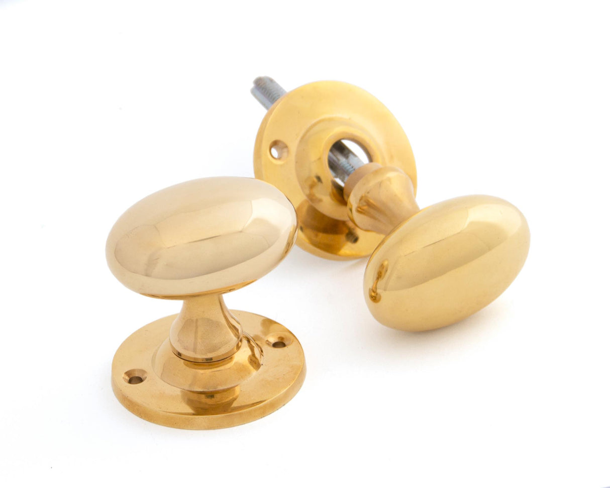 From The Anvil - Polished Brass Oval Mortice/Rim Knob Set | Sku. 83627 | Trade Door Handles.