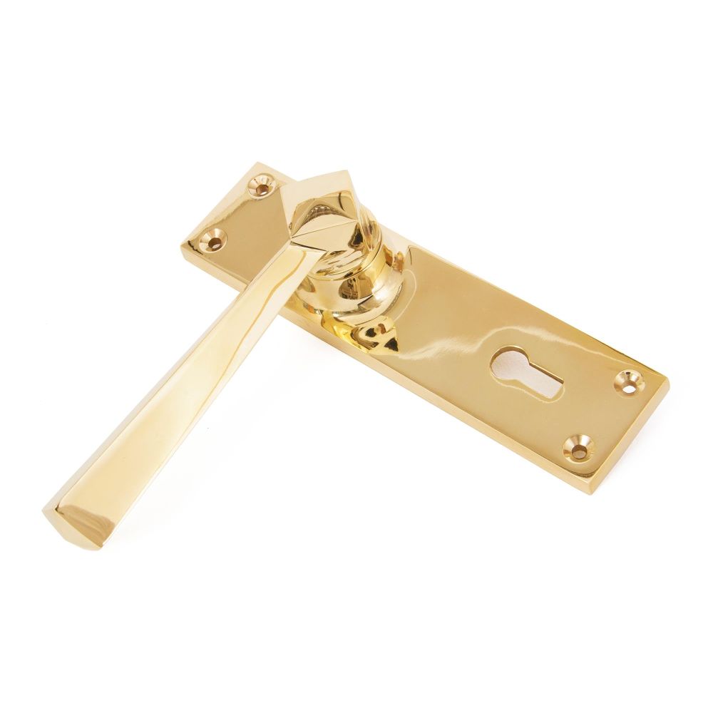 From The Anvil - Polished Brass Straight Lever Lock Set | Sku. 83829 | Trade Door Handles.