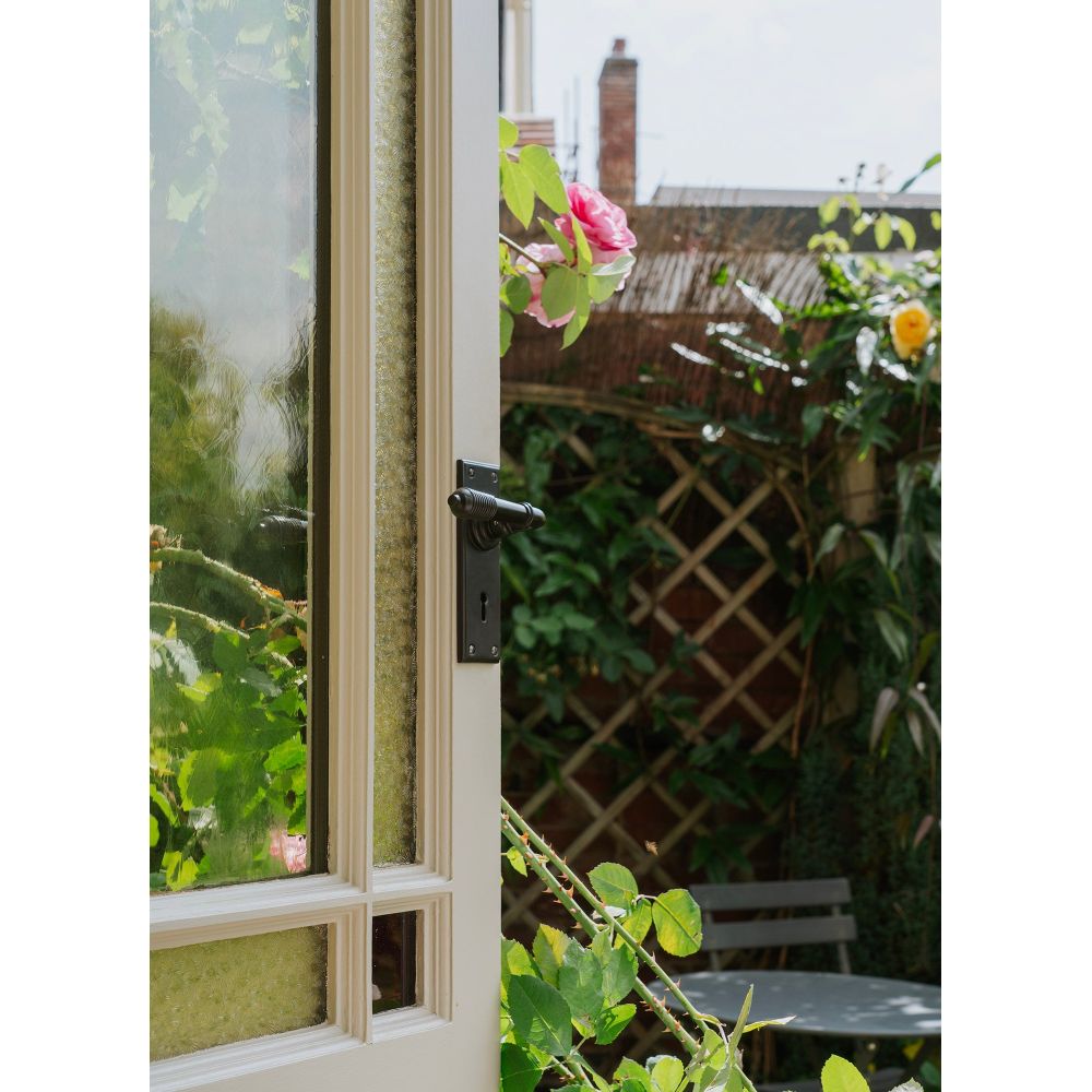 From The Anvil - Aged Bronze Reeded Lever Lock Set | Sku. 83953 | Trade Door Handles.