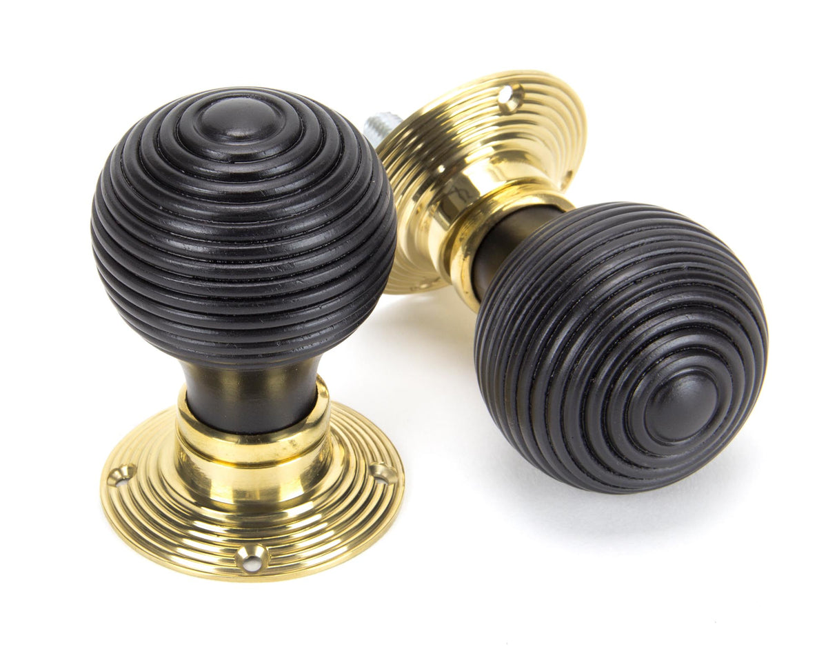 From The Anvil - Ebony & Polished Brass Beehive Mortice/Rim Knob Set | Sku. 91729 | Trade Door Handles.