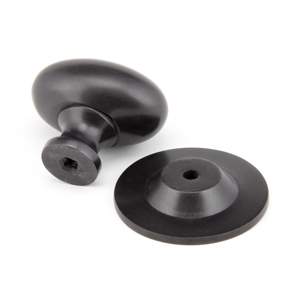 From The Anvil - Aged Bronze Oval Cabinet Knob 40mm | Sku. 92035 | Trade Door Handles.