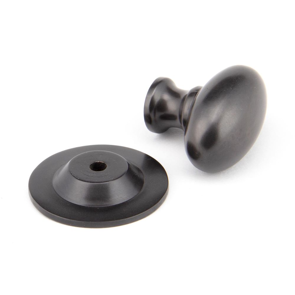 From The Anvil - Aged Bronze Oval Cabinet Knob 33mm | Sku. 92036 | Trade Door Handles.