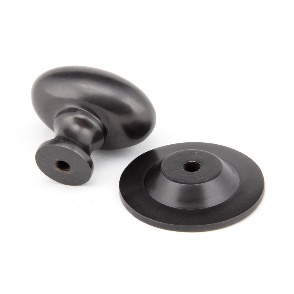 From The Anvil - Aged Bronze Oval Cabinet Knob 33mm | Sku. 92036 | Trade Door Handles.