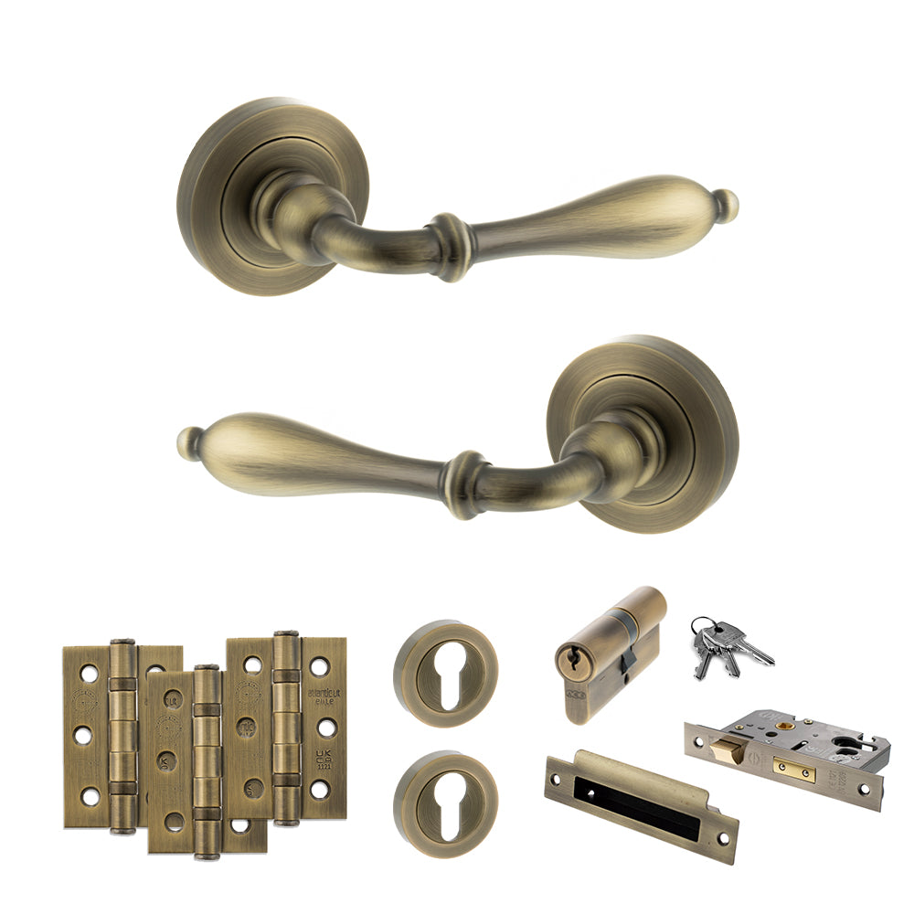 Quality image of Old English Wrexham Door Handle Pack (Euro Lock Set - 3" CE Sashlock, 3" Fire Rated Hinges x3) - Matt Antique Brass | Sku. adpoe142mab21 | available from Trade Door Handles.