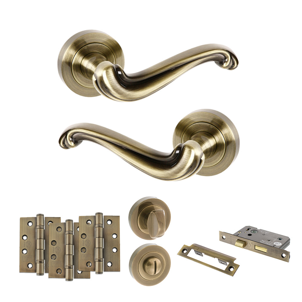 Quality image of Old English Colchester Door Handle Pack (Bathroom Set - 2.5" CE Bathroom Lock, 4" Fire Rated Hinges x3) - Antique Brass | Sku. adpoe177ab10 | available from Trade Door Handles.