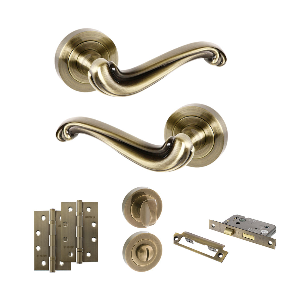 Quality image of Old English Colchester Door Handle Pack (Bathroom Set - 2.5" CE Bathroom Lock, 4" Slim Knuckle Hinges x2) - Antique Brass | Sku. adpoe177ab12 | available from Trade Door Handles.