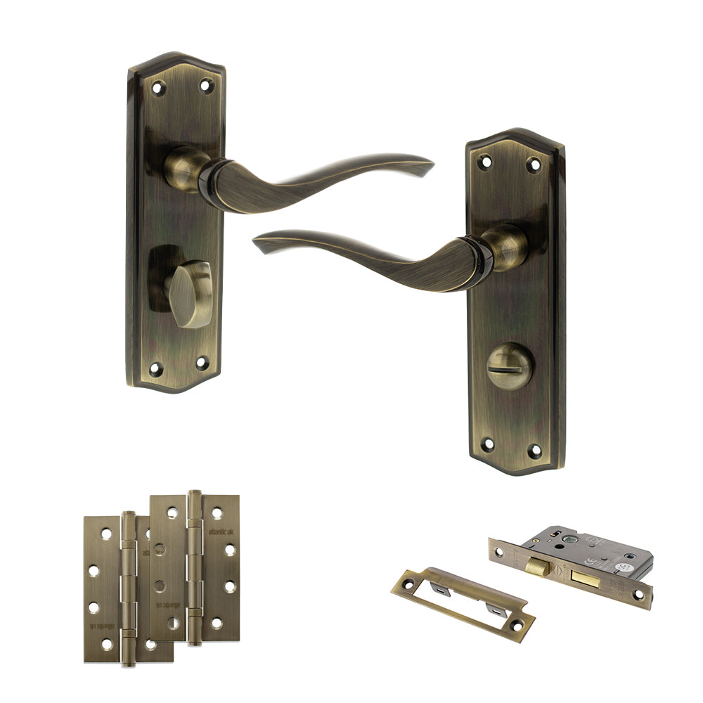 Quality image of Old English Warwick Door Handle Pack (Bathroom Set - 2.5" CE Bathroom Lock, 4" Slim Knuckle Hinges x2) - Antique Brass | Sku. adpoe178wcab12 | available from Trade Door Handles.