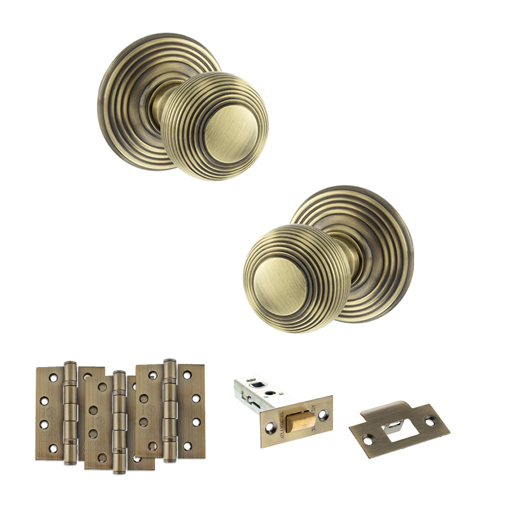 Quality image of Old English Ripon Door Knob Pack (Latch Set - 4" HD Latch, 4" Fire Rated Hinges x3) - Antique Brass | Sku. adpoe50rmkab57 | available from Trade Door Handles.