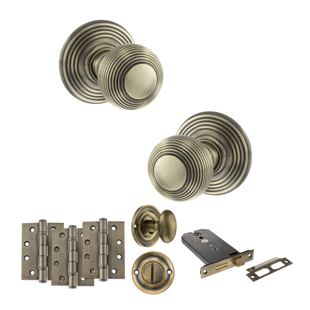 Quality image of Old English Ripon Door Knob Pack (Lock Set - Horizontal Bathlock, 4" Fire Rated Hinges x3) - Antique Brass | Sku. adpoe50rmkab72 | available from Trade Door Handles.