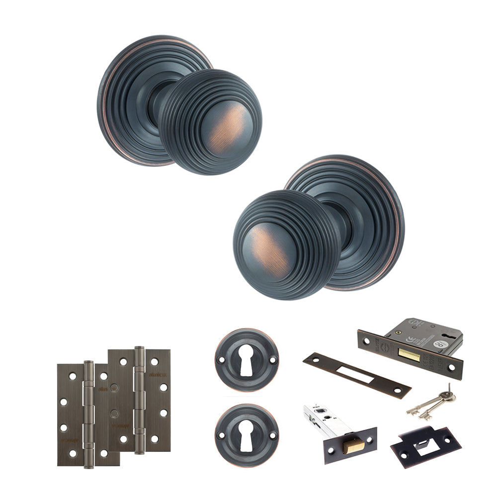 Quality image of Old English Ripon Door Knob Pack (Lock Set - 3" Latch & Deadlock, 4" Slim Knuckle Hinges x2) - Antique Copper | Sku. adpoe50rmkac68 | available from Trade Door Handles.
