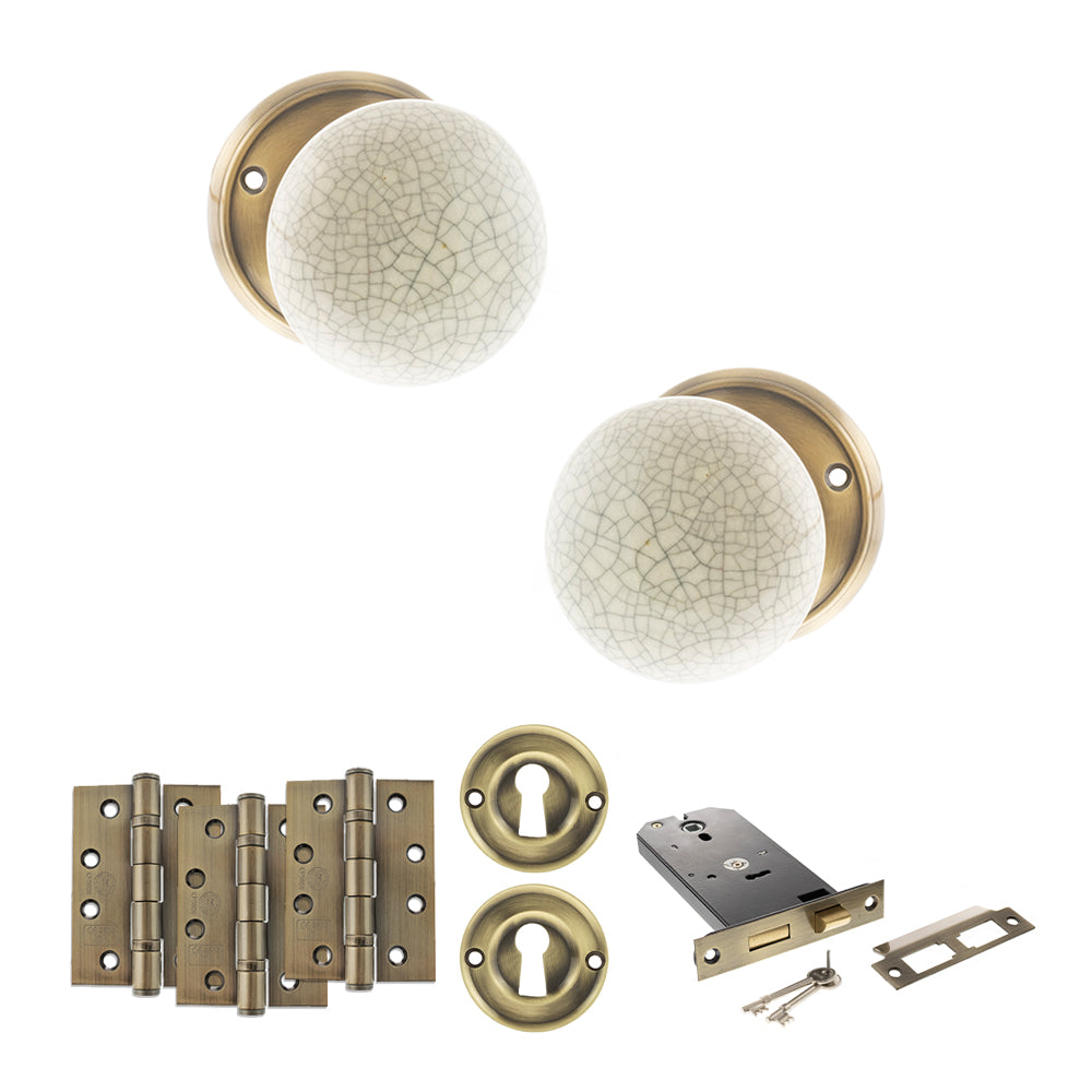 Quality image of Old English Skipton Door Knob Pack (Lock Set - Horizontal Sashlock, 4" Fire Rated Hinges x3) - Antique Brass | Sku. adpoe59cmkcab71 | available from Trade Door Handles.