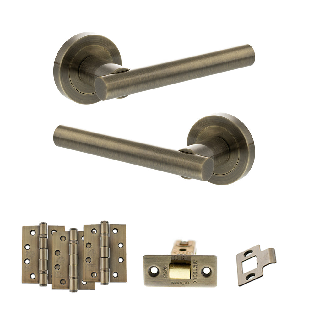 Quality image of STATUS Nebraska Door Handle Pack (Latch Set - 3" CE Latch, 4" Fire Rated Hinges x3) - Antique Brass | Sku. adps28rab4 | available from Trade Door Handles.