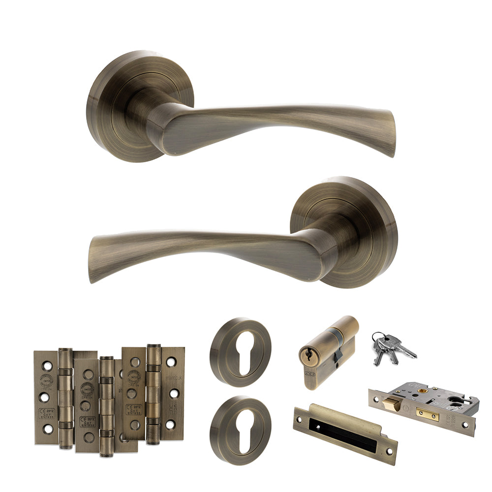 Quality image of STATUS Colorado Door Handle Pack (Euro Lock Set - 3" CE Sashlock, 3" Fire Rated Hinges x3) - Antique Brass | Sku. adps34rab21 | available from Trade Door Handles.