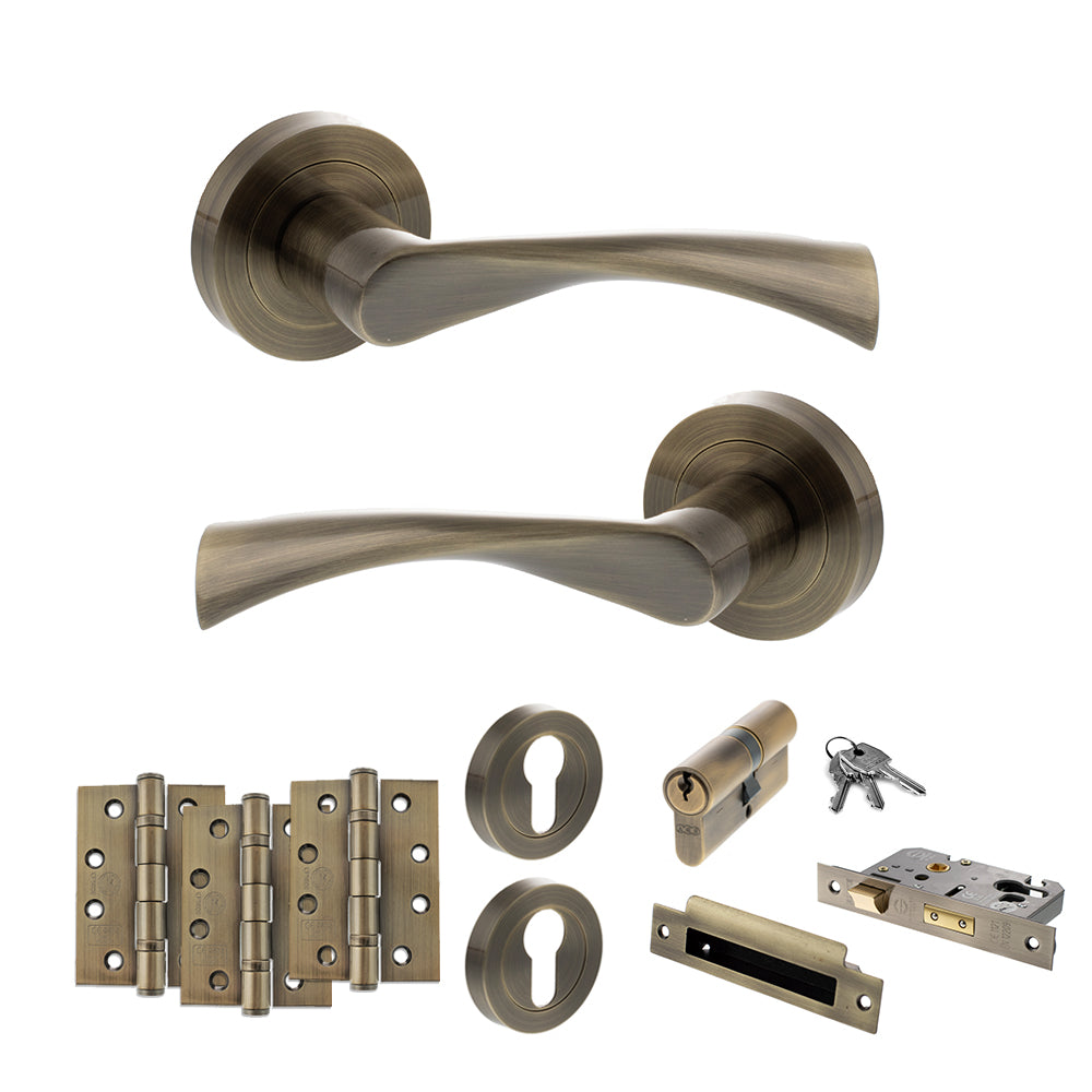 Quality image of STATUS Colorado Door Handle Pack (Euro Lock Set - 2.5" CE Sashlock, 4" Fire Rated Hinges x3) - Antique Brass | Sku. adps34rab22 | available from Trade Door Handles.