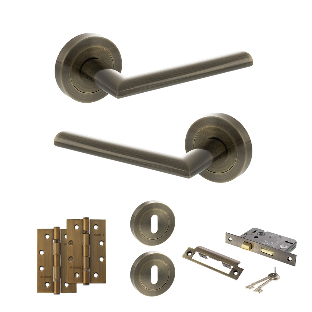 Quality image of STATUS Alabama Door Handle Pack (3 Lever Lock Set - 3" CE Sashlock, 4" Slim Knuckle Hinges x2) - Antique Brass | Sku. adps43rab19 | available from Trade Door Handles.