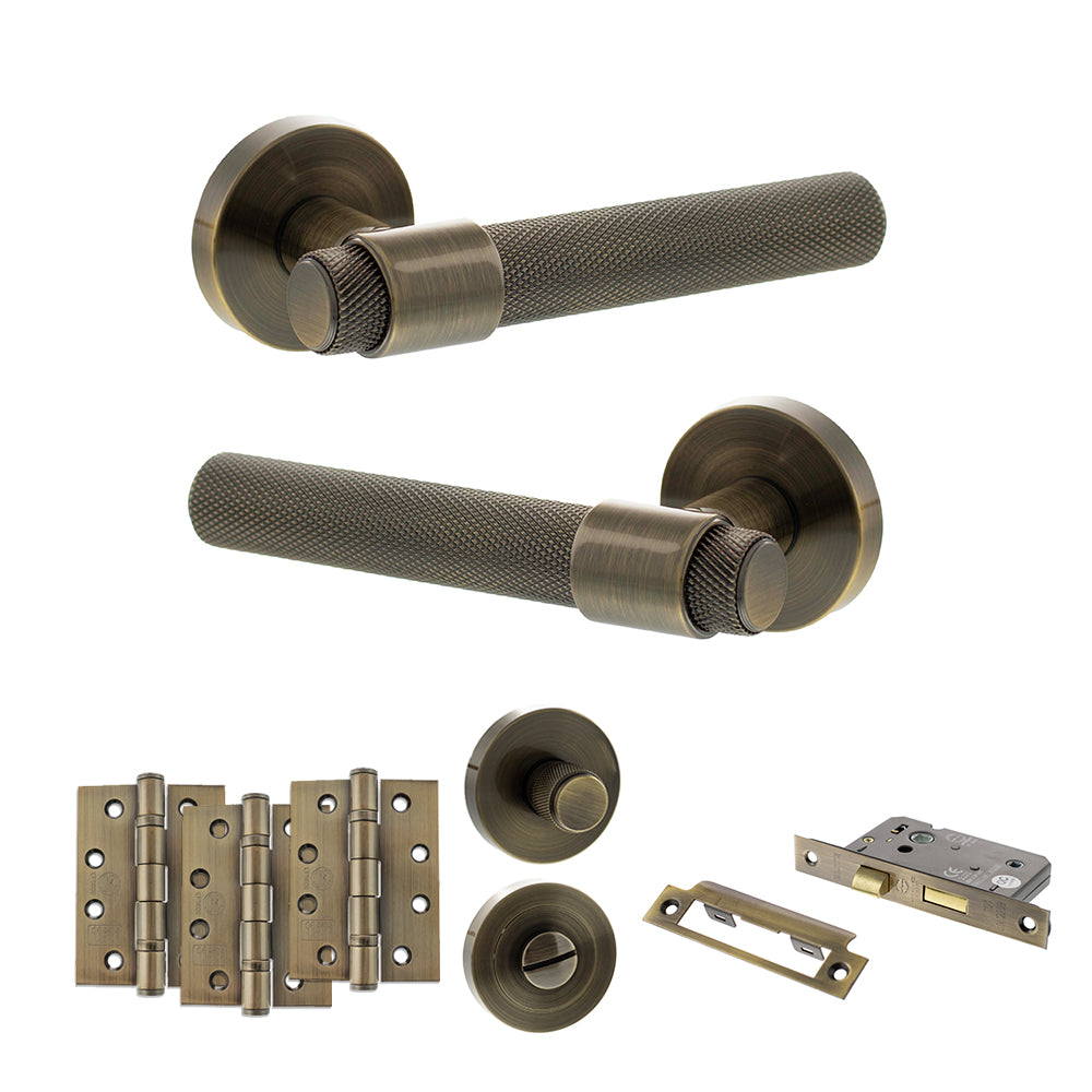 Quality image of Senza Pari Andretta Door Handle Pack (Bathroom Set - 2.5" CE Bathroom Lock, 4" Fire Rated Hinges x3) - Antique Brass | Sku. adpspr160ab10 | available from Trade Door Handles.