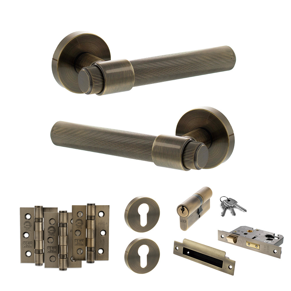 Quality image of Senza Pari Fasana Door Handle Pack (Euro Lock Set - 3" CE Sashlock, 3" Fire Rated Hinges x3) - Antique Brass | Sku. adpspr165ab21 | available from Trade Door Handles.