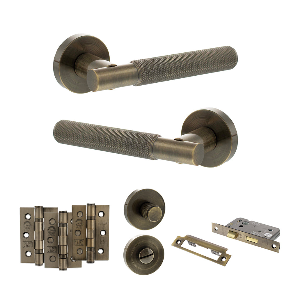 Quality image of Senza Pari Rosarno Door Handle Pack (Bathroom Set - 3" CE Bathroom Lock, 3" Fire Rated Hinges x3) - Antique Brass | Sku. adpspr170ab9 | available from Trade Door Handles.