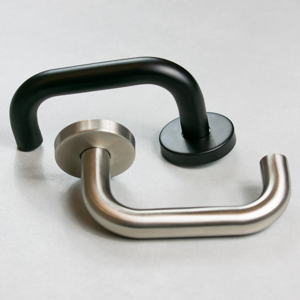 Quality image of Atlantic Return To Door Lever Door Handle - Satin Stainless Steel | Sku. alrtdsss | available from Trade Door Handles.