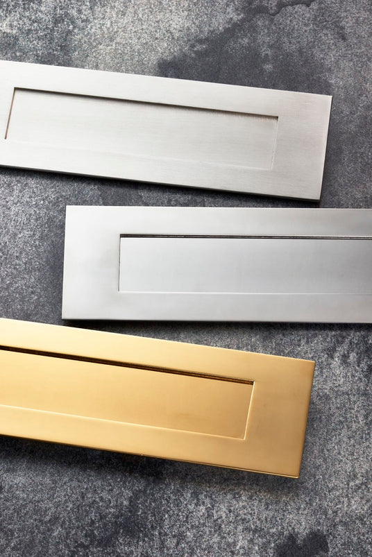 This is an image showing a range of Carlisle Brass-Letter-Plates