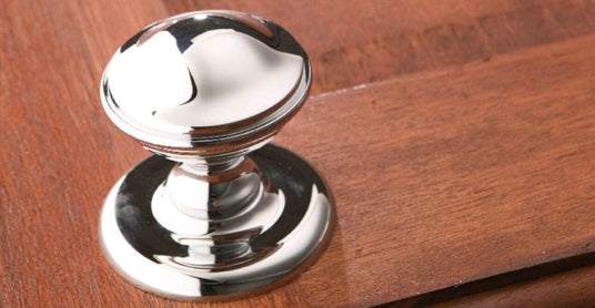 This is an image of Carlisle Brass - Round Centre Door Knob - Polished Chrome - M60CP