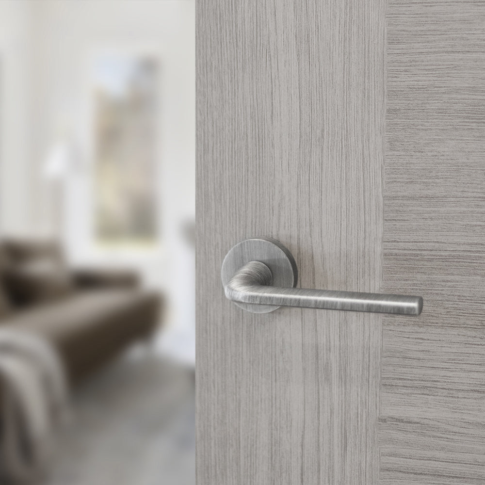 Quality image of Forme Milly Lever Door Handle on Minimal Round Rose - Urban Graphite | Sku. fmr133ug | available from Trade Door Handles.