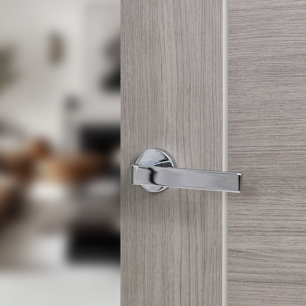 Quality image of Forme Asti Lever Door Handle on Minimal Round Rose - Polished Chrome | Sku. fmr254pc | available from Trade Door Handles.