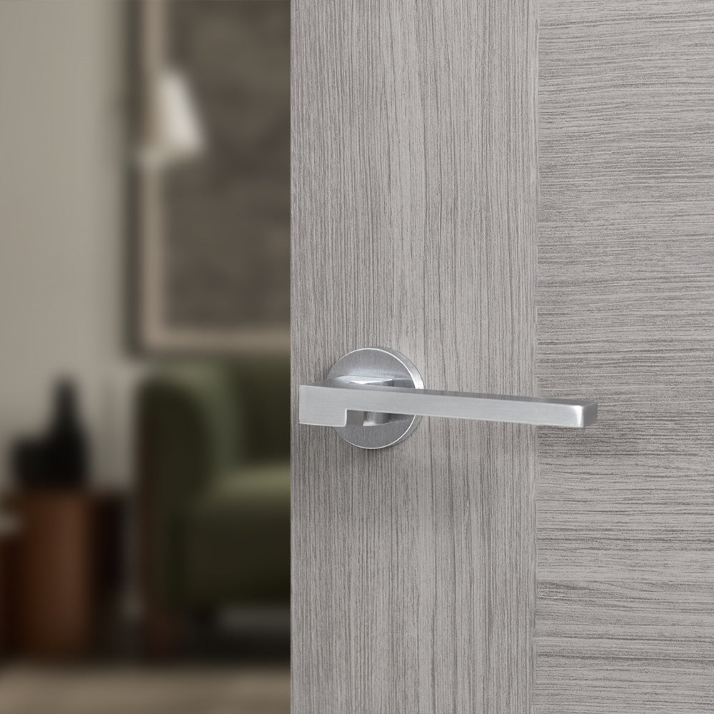 Quality image of Forme Ginevra Lever Door Handle on Minimal Round Rose - Satin Chrome | Sku. fmr430sc | available from Trade Door Handles.