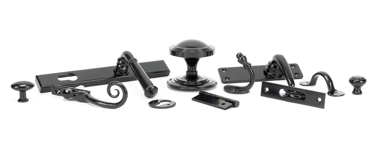 Image showing a range of Black Door and Window Furniture by From The Anvil. Available to order from Trade Door Handles in Kendal