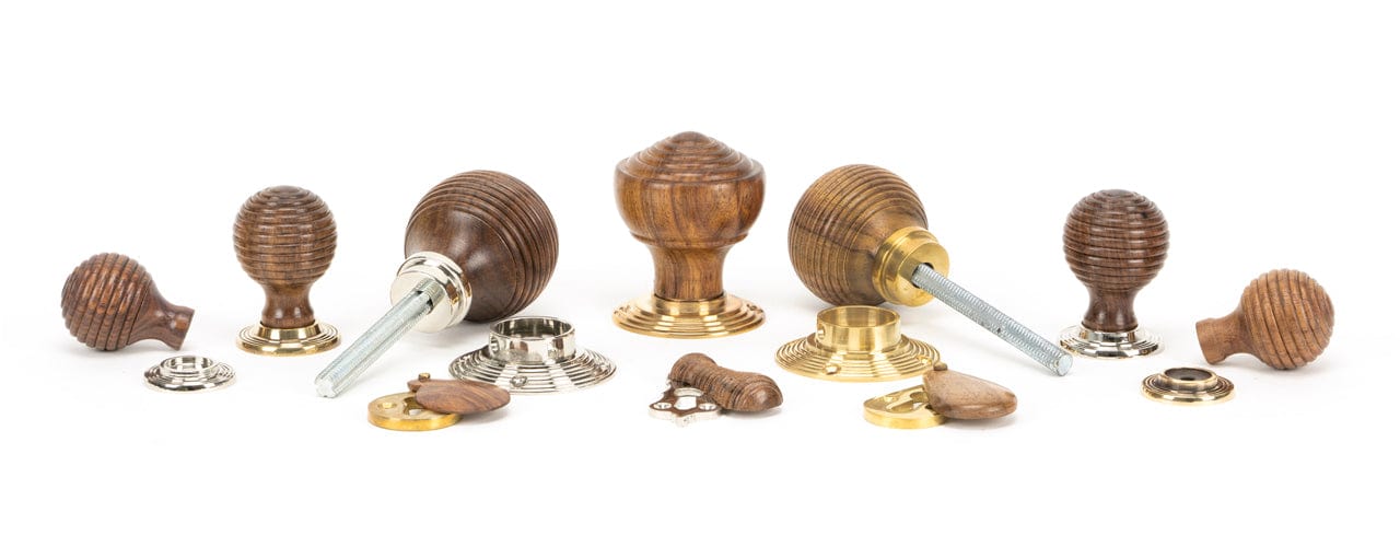 Image showing a range of From The Anvil Ironmongery and Hardware in Rosewood. Available to order from Trade Door Handles in Kendal