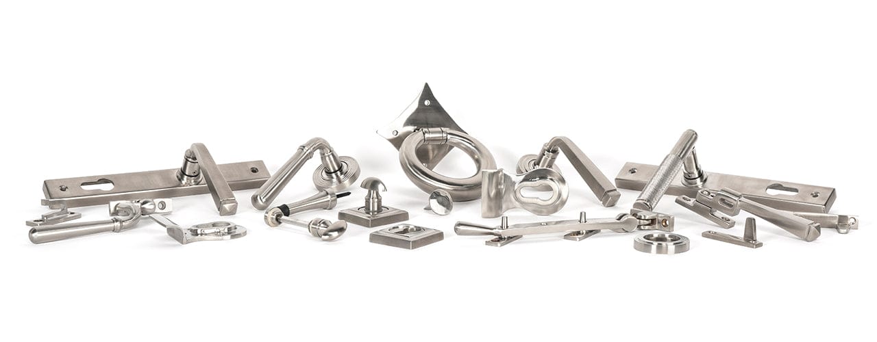 Image showing a range of From The Anvil Ironmongery and Hardware in Marine Grade 316 Satin Stainless Steel. Available to order from Trade Door Handles in Kendal