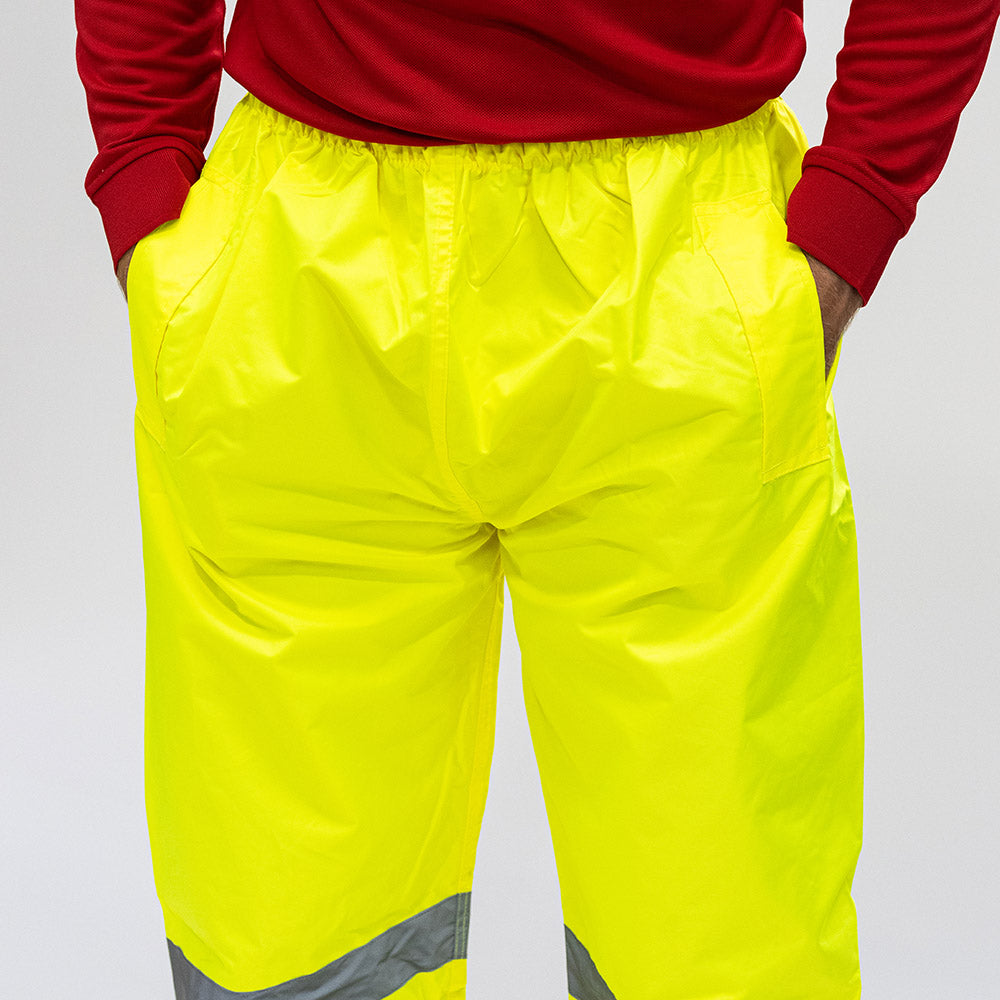 This is an image of Timco - Hi-Visibility Elasticated Waist Trousers - Yellow Medium (1 Each Bag) HVETRSMED