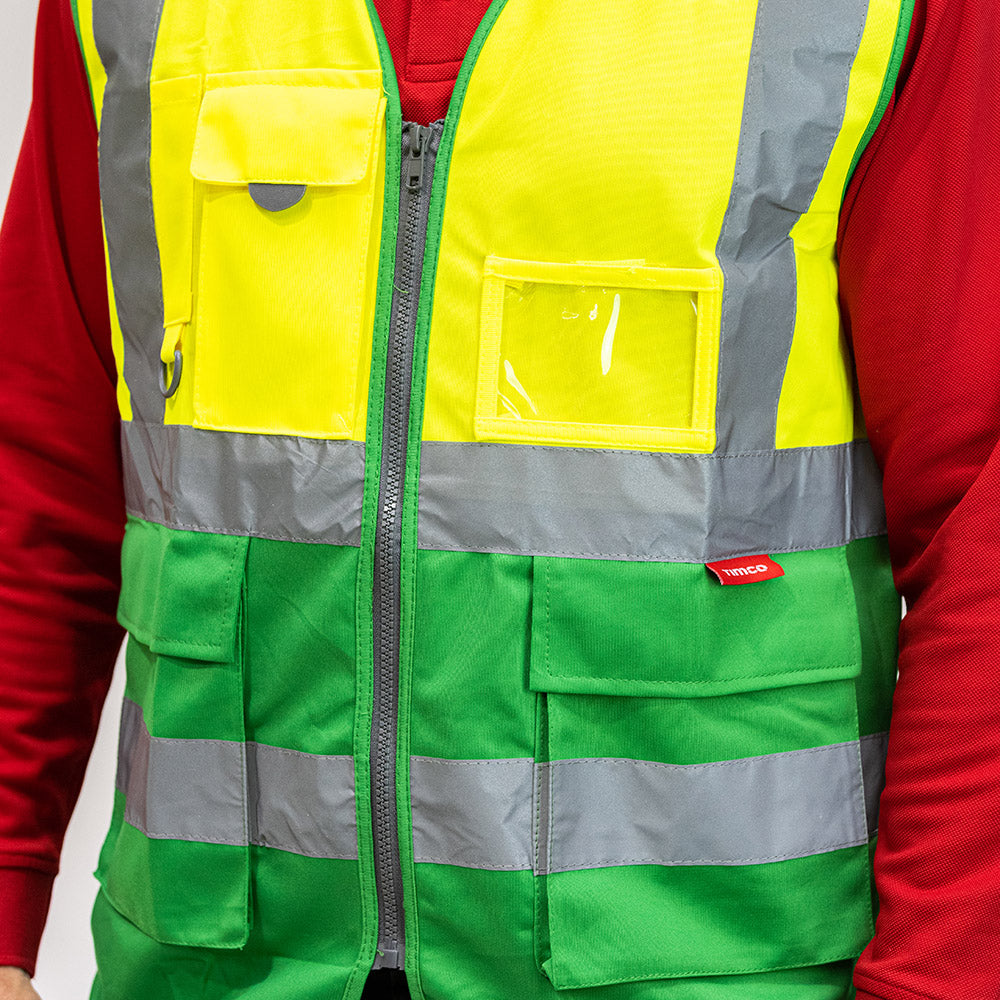 This is an image of Timco - Hi-Visibility Executive Vest - Yellow & Green XXXX Large (1 Each Bag) HVVYG4XL