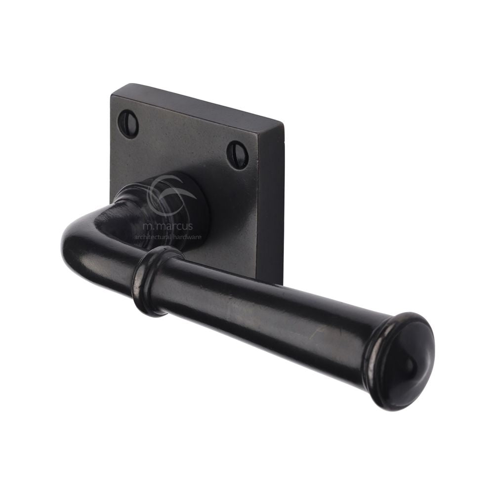 High quality image of M.Marcus - Rustic Dark Bronze Door Handle Lever Latch on Square Rose Claverley Design | Sku. rdb1933 | available from Trade Door Handles.
