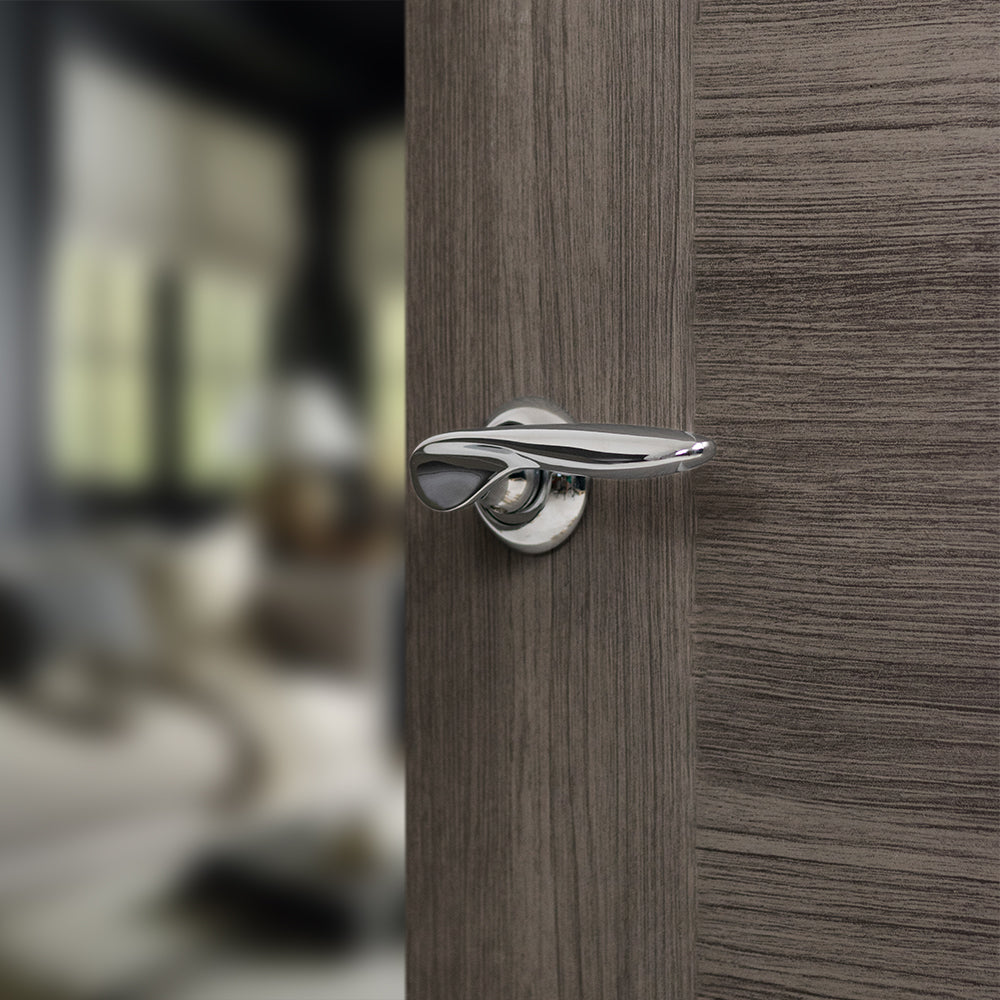 Quality image of Mediterranean Malta Lever Door Handle on Round "C" Rose - Polished Chrome | Sku. mc25cp | available from Trade Door Handles.