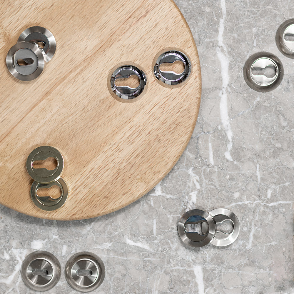 Quality image of Mediterranean Key Escutcheons on Round Rose - Polished Brass | Sku. mesckbp | available from Trade Door Handles.