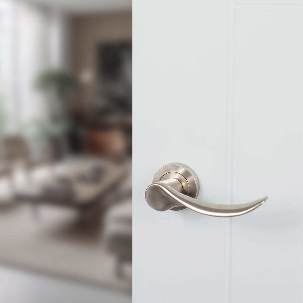Quality image of Mediterranean Malaga Lever Door Handle on Round Rose - Satin Nickel | Sku. m27sn | available from Trade Door Handles.