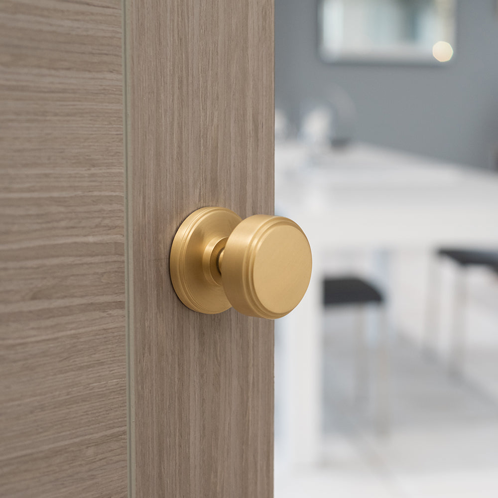 Quality image of Millhouse Brass Boulton Solid Brass Stepped Mortice Door Knob on Concealed Fix Rose - Satin Brass | Sku. mh350smksbsolid | available from Trade Door Handles.