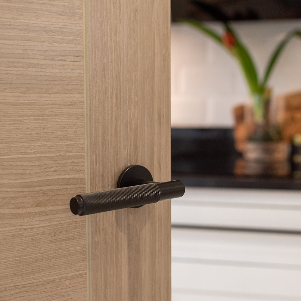 Quality image of Millhouse Brass Crompton Knurled Lever Door Handle on 5mm Slimline Round Rose - Urban Dark Bronze | Sku. mhsr100udb | available from Trade Door Handles.
